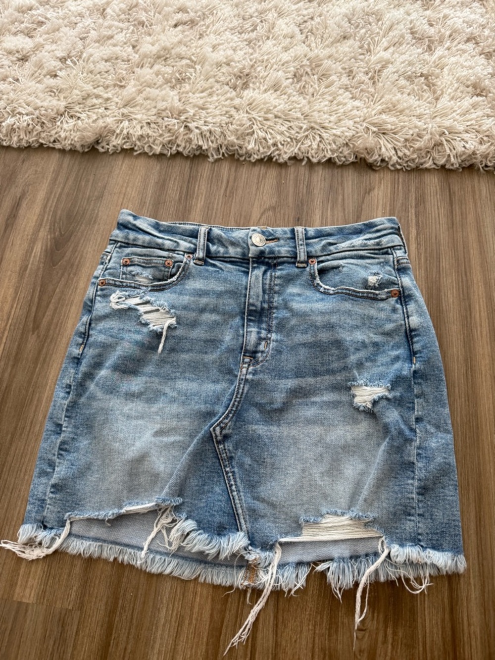 American Eagle Outfitters Light Blue Distressed Denim Mini Skirt